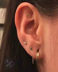 Adriancastillo On Instagram Fresh Faux Rook Done With A Yellow Gold Double Oru Ear Jewelry Geode Earrings Ear Piercings