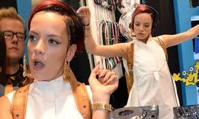 Lily Allen digs out signature thick gold bamboo hoop earrings at backpack  launch