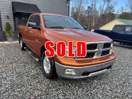 Image result for Omaha Orange 2010 Dodge Truck