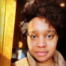 WHILE WE WAIT by Charly Evon Simpson