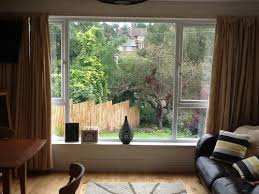 Curtains can accentuate the height of a room and also frame the shape of windows and doors so that they don't appear unadorned. Big Windows What To Put Up Blinds Curtains Shutters