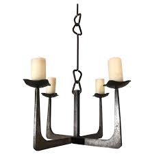 Smtyle hanging candle chandelier for set of 6 tealight candle metal wall sconce for indoor or outdoor black. Early 20th Century Arts And Crafts Wrought Iron Candle Lamp Four Candle Chandelier For Sale At 1stdibs