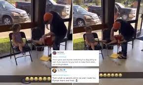 Video of man spanking a little boy and yelling sit your a** down to a  girl sparks outrage | Daily Mail Online