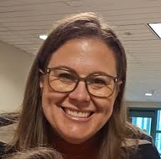 Who can make a quilt from old camp shirts with front and back designs in  Haysville?