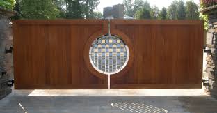 Aluminum, stainless steel, galvanized residential and commercial gates. Cedar Gate With Polished Basket Weaved Stainless Steel Design Finelli Ironworks