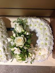 Maybe you would like to learn more about one of these? White Based Funeral Letter D With White Ribbon Edge And Large White Spray Funeral Flowers Funeral Flower Arrangements Mums Flowers