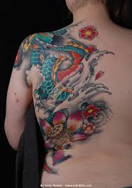 The feet look like the landing gears are down and the wearer can raise their arm to. Monki Do Tattoo Studio