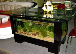 Anda bisa mendekorasi banyak hal untuk interior rumah, salah satunya adalah dengan menambahkan aquarium. Aquarium Unik Meja Kayu Dekor Desain Akuarium Aquarium