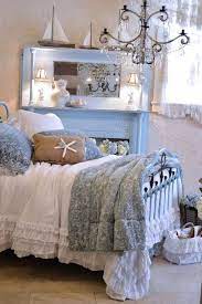 How dreamy is this coastal bedroom with the bed hanging from ropes from the ceiling? Pin On Duck Egg