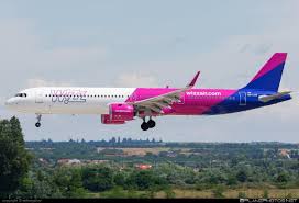 Wizz air is operating in madrid barajas airport, terminal 1. Wizzair Planet Airlines