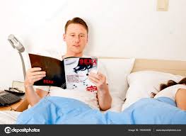 Enjoying A Porn Magazine — Stock Photo © nullplus 152253492