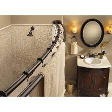 Shower doors and glass tubs do an awesome job of keeping the water in the shower area. Moen Curved 57 In Adjustable Shower Rod In Old World Bronze Dn2140owb Walmart Com Walmart Com