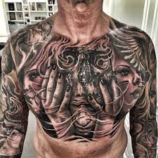 The placement of tattoos is a key factor to consider and chest tattoos has a way of enhancing some of the cool features that define masculinity. 125 Best Skull Tattoos For Men Cool Designs Ideas 2021 Guide Chest Tattoo Men Chest Tattoo Drawings Skull Tattoos