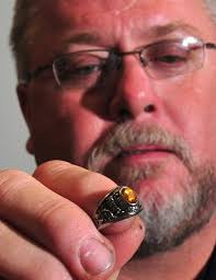 Man wants to find owner of lost high school ring