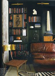 Masculine Black Bookshelves Via Elle Decor Interior Masculine Interior Black Walls