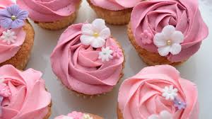 Pipe white spokes on buggy wheels and attach mini m&m's for hubcaps. Cupcake Decorations Buttercream Rosettes With Fondant Flowers Flower Power Youtube