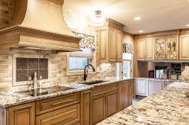Fine kitchen cabinet doesn't compromise over the quality but sure the price is reasonable. Moving Beyond White Kitchen Cabinetry Sims Lohman Fine Kitchens And Granite