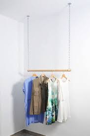 Whether you decided to go for a swim in the lake or you need to air out your clothes after washing them, a drying rack is always a good idea! Wooden Floating Hanging Clothes Rack Hanging Clothes Racks Diy Clothes Rack Hanging Clothes