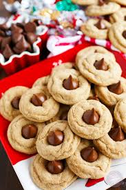 Hershey's kiss cookies are soft and chewy chocolate cookies topped with hershey kisses, ready in under 30 minutes! Peanut Butter Blossom Cookies Table For Two By Julie Chiou