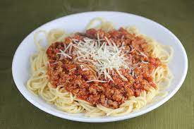 0:36 mix in basil, oregano, italian seasoning, and crushed tomatoes. Olive Garden Bolognese Sauce Recipe Blogchef