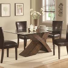 The fiberglass backing is an artistic design base made of durable rubber wood. Modern 4 Seater Dining Table Design With Glass Top