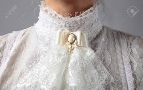 Pretty woman in ball dress. Fragment Of A Victorian Dress With A Brooch White Blouse With Stock Photo Picture And Royalty Free Image Image 116153866