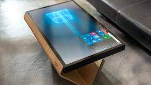 The wooden table incorporates a fully functioning windows 8 pc with an enormous 32 touch screen. La Table Kineti Touch Screen Coffee Table Imboldn