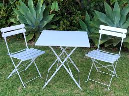 White chair with straw hat. Wedding Hire White Palms Wedding Event Hire