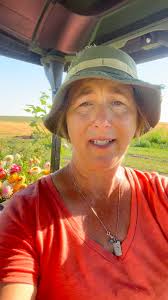 She sometimes hits it with her nose to keep it going and then catches it.