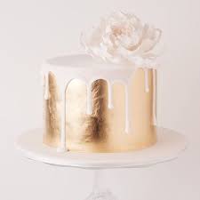 Black And Gold Drip Cake With Flowers Gorgeous Cake Drip Cakes Cake Beautiful Cakes
