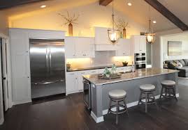 The new koch cabinets are maple slab fronts painted oyster and include many bells and whistles in cabinet accessories. Dining Kitchen Portside Builders Kitchen Remodel Wisconsin