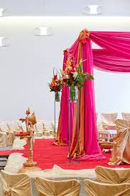 Wedding decorations, balloons, silk flower hire, chair cover hire, wedding stage decorations for asian and indian weddings. Indian Wedding Decorations Indian Wedding Flowers Mandap Decoration Ideas Minneapolis Indian Wedding Mandap Draping Hot Pink And Orange Altar Arrangements Radisson Blu Mall Of America Luna Vinca