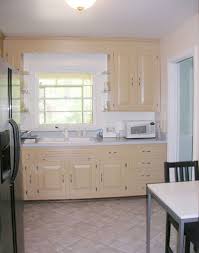 As you finish each section, go back over the paint with a fine bristle. Painting Your Kitchen Cabinets Is Easy Just Follow Our Step By Step Tutorial
