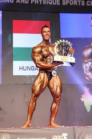 This gigantic muscular man is almost 2 meters in high (195cm/6'5'') and his weight can reach about 130kg/290lb. 2014 Wbpf World Championship Wikiwand