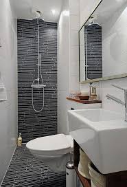 The black and white color scheme makes it all the more striking. Small Ensuite Bathroom Google Search Small Bathroom Small Bathroom Design Small Bathroom Decor