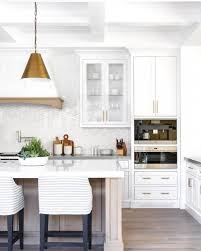Wood backsplash looks fabulous in modern farmhouse kitchens, rustic, and industrial spaces. 20 Best Modern White Kitchen Cabinet Ideas