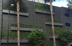 This type of fence decor is suitable for growing a wide variety and a large amount of plants because its size and shape can handle more compared to pots. 09a Tournesol Wilshire Hanging Planter Box Collection Moodie Outdoor Products