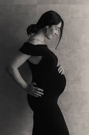 Maternity Photograph Mother In A Black Dress Maternity Studio Photoshoot Indoor Maternity Photography Indoor Maternity Photos