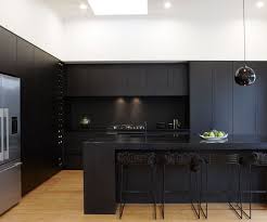 It is glamorous, fun and well paid. A Matte Black Kitchen Makes A Bold Statement In This Auckland Villa Matte Black Kitchen Modern Black Kitchen Black Kitchens