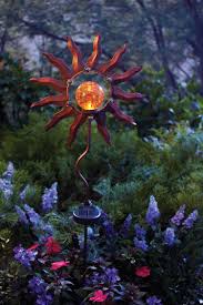 Solar Powered Decorative Ideas To Light Up Your Yard Solar Garden Stakes Solar Landscape Lighting Solar Lights Garden