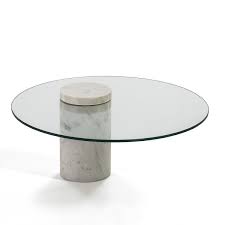 Pierimport.fr dispose de nombreux modèles en bois dont vous apprécierez la robustesse. Thai Mobilier Table Basse Ronde Verre Trempe Et Marbre Blanc Siru Lestendances Fr