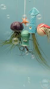 An Octopus Garden Of Hanging Air Plants Featuring An Octopus Squid Jellyfish And Nautilus An Aquatic Wonderland Hanging Air Plants Air Plants Planters