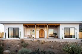 Home Tour A Mediterranean And Southwest Inspired Joshua Tree Abode Sunset In 2020 Modern Prefab Homes Hot Tub House Desert Homes
