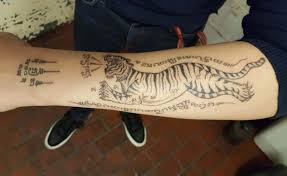 The 8 direction sak yant tattoo meaning. 10 Sak Yant Tattoo Ideas Tiger Tattoo Designs Petpress