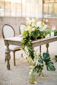 Modern Minimalist Clean White And Green Wedding In A Greenhouse On The California Coast Santa Barbara Vibes Wit Wooden Table Decor Table Decorations Decor