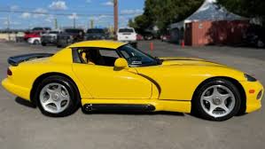 Image result for Daytona Yellow 1994 Reliant