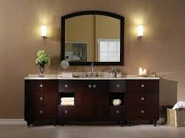 Design house strip light traditional / classic 4 light ambient lighting bathroom vanity fixture with honey oak back plate. Bathroom Lighting Styles And Trends Hgtv