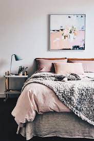 It is situated beside a gray nightstand and over a shaggy rug covering the wood plank floor. Pin By Mirley Erices On Home Home Bedroom Home Bedroom Decor
