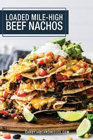 Loaded Mile High Beef Nachos Recipe Nachos Beef Nachos Delicious Snacks Recipes