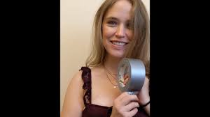 Button Applies Duct Tape to Her Mouth to Perform a Handjob and Then Slurp  Up the Cum